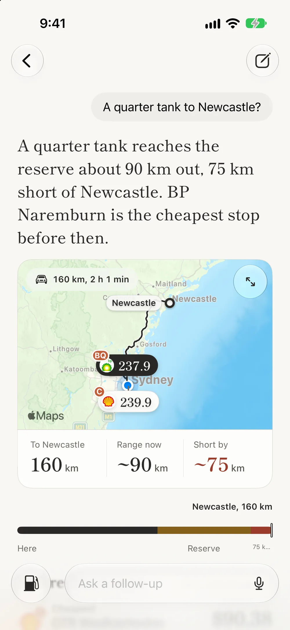 The Assistant: a quarter tank reaches the reserve about 90 km out, 75 km short of Newcastle, with a map of the route and the cheapest stop